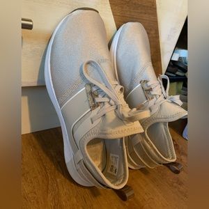 Champagne colored sneakers.